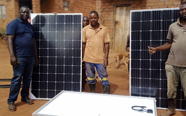 Good Nature Agro Phiri-brothers-Farmers-receiving-equipment